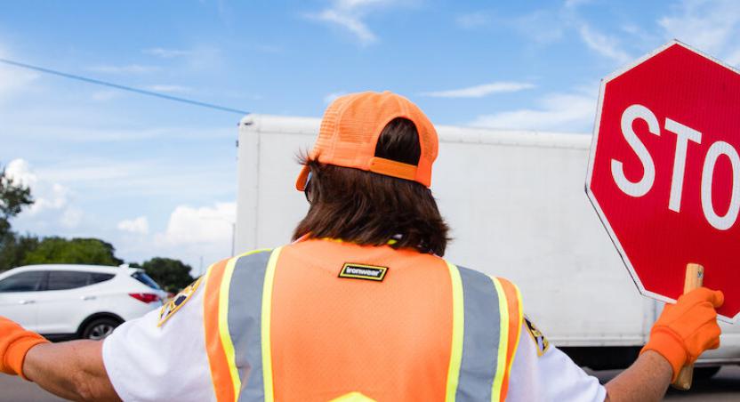 crossing guard with stop sign