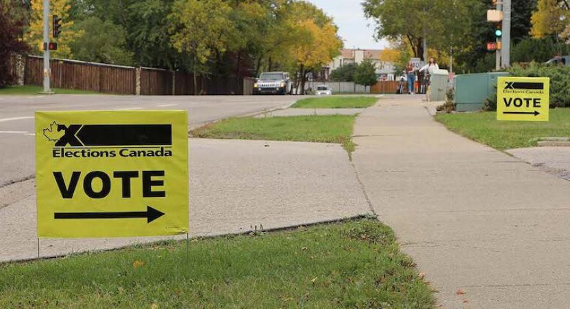 vote sign on lawn