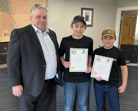 Mayor Andy Lennox, Grayson Dann and Hudson Dann.